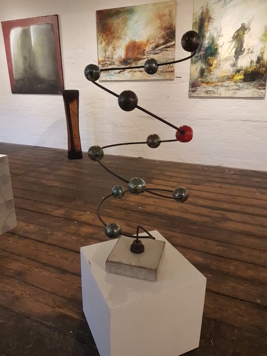 Intergration of the red dot, Rakubrændt keramin på jern